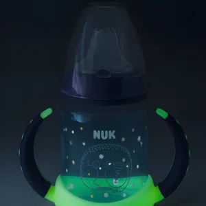 Cana cu cioc din silicon Nuk First Choice 150 ml cu toarte fluorescente