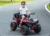 Atv electric copii Nichiduta Ultimate Race Red 12V,roti eva,2 motoare,portbagaj cu capac,faruri led,functie swing si slow start,amortizor cu arc pe spate