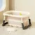 Cadita 3 in 1 pentru copii Little Mom Pink, pliabila, echipata cu masuta de joaca detasabila, cu dus functional si dop evacuare apa, picioruse reglabile in inaltime, dimensiune 78.5 x 51.5 x 38 cm