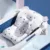 Hamac de baie pentru copii, Little Mom, design ergonomic cu fixare pe cadita in clipsuri laterale, material cu uscare rapida umplut cu bilute mici de poliester, dimensiune 76 x 51 cm, Baby Stars
