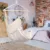 Hamac tip scaun, 100×130 cm, 2 perne, bara din lemn, bumbac bej