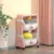 Organizator pentru copii Little Mom Piggy Pink cu 2 nivele, echipat cu 2 cutii deschise, prevazut cu roti, dimensiuni 63x40x27 cm