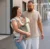 Sistem de purtare Babymoov transformabil in Booster Moov  Boost verde salvie
