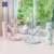 Suport pentru uscat biberoane KikkaBoo Tulip Grey,capacitate pana la 8 biberoane,din plastic nontoxic fara BPA